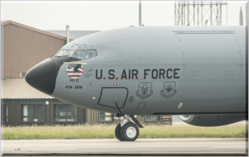 Reach 445 showing its "Lets Roll" nose art
